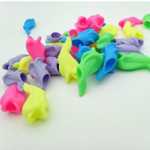 Candy color dolphin silicone pen grip corrector children's fish pen grip silicone high quality material non-toxic and odorless