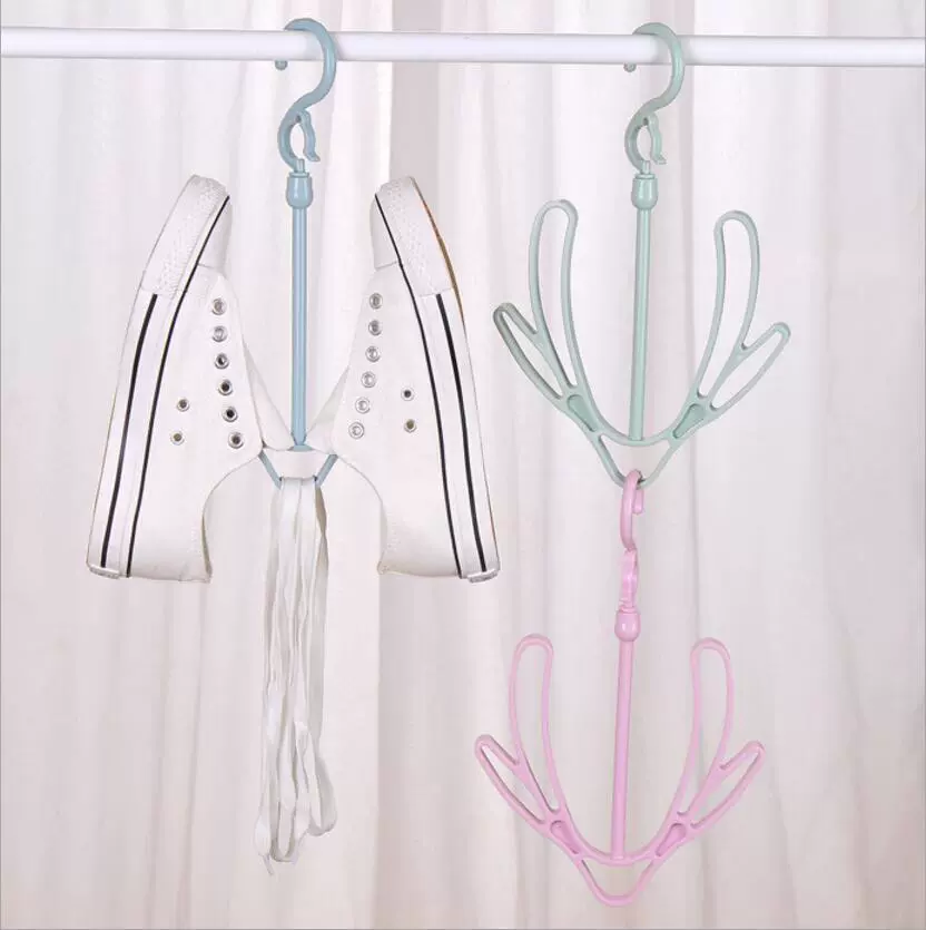 Creative windproof universal shoes, footwear, hook to dry