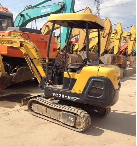 Exportación de comercio exterior con carga 60 y 70 trinidad excavadora