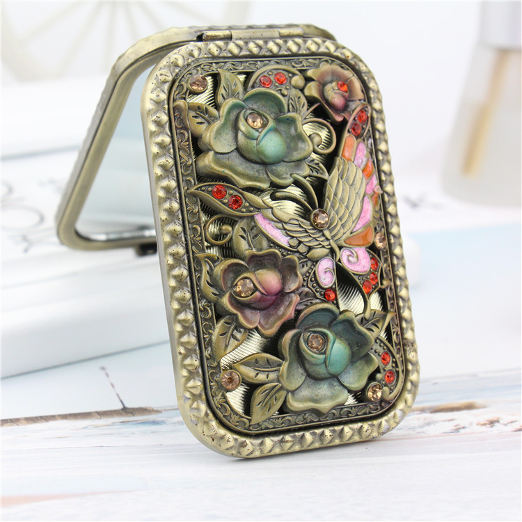 Folding handheld double-sided rectangular mirror