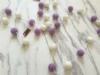 Wool ball sibling: white+purple