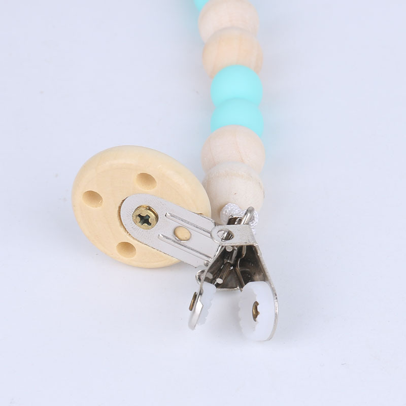 Venta directa de fábrica bebé calmante chupete de madera clip chupete cadena juguete anti-gota cadena mordedura música Comercio exterior Venta caliente