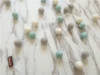 Wool ball sibling: white+gray+green