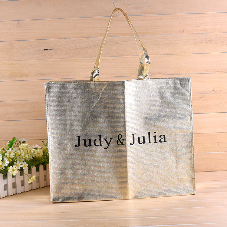 专业定制镭射覆膜金色无纺布婚纱服装包装袋