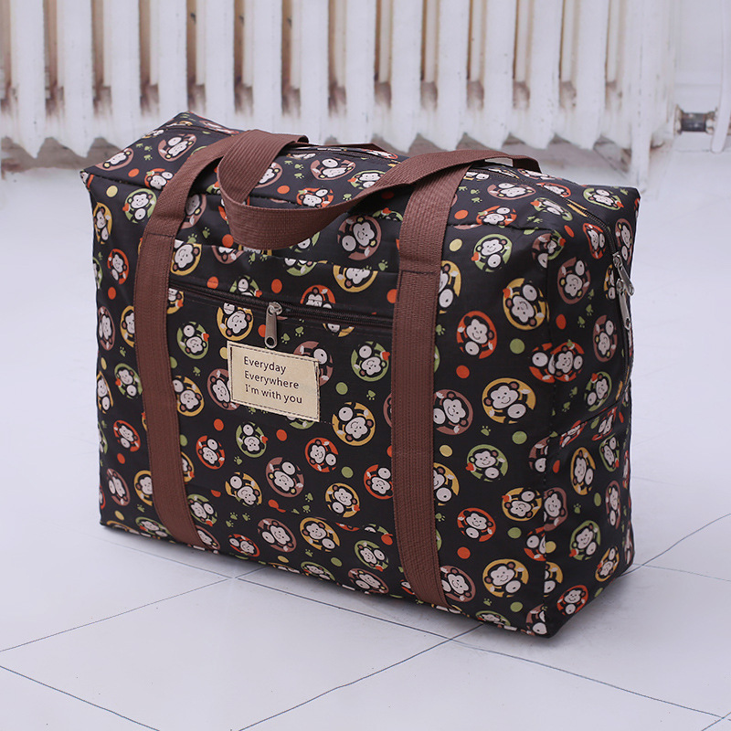 卡通大容量旅行袋 调皮猴可折叠棉被收纳袋可套拉杆箱手提行李包