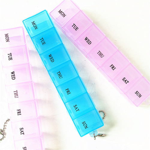 Best-selling long transparent storage box plastic pill box, portable seven-compartment small pill box for a week, printed with logo