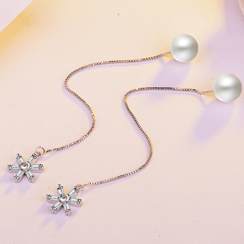 Earrings solar-powered with zircon