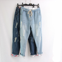 200 kg size lớn 2019 quần jeans nữ mùa thu rộng rãi cộng với phân bón tăng quần harem chất béo quần mm thủy triều Quần áo nữ size lớn