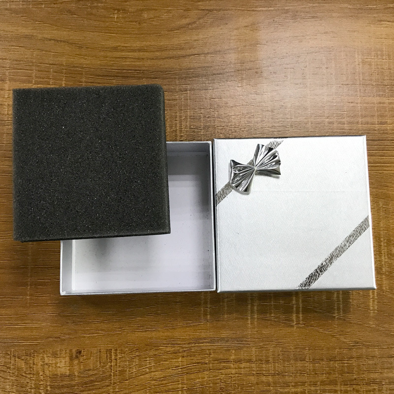 Caja de joyería caja de pendientes arco caja de joyería caja de anillo pequeña caja de embalaje de papel gris entrega de una pieza