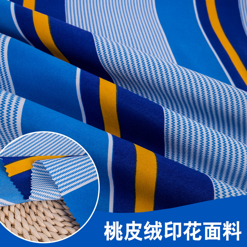 厂家供应夏季沙滩裤速干面料 斜纹桃皮绒印花短裤布料 现货批发