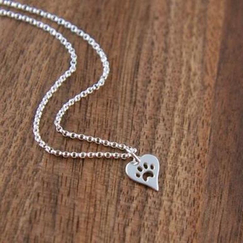 New Cute Animal Cat Paw Foot Necklace Openwork Peach Heart Necklace Heart Shaped Dog Paw Print Necklace Wholesale display picture 1