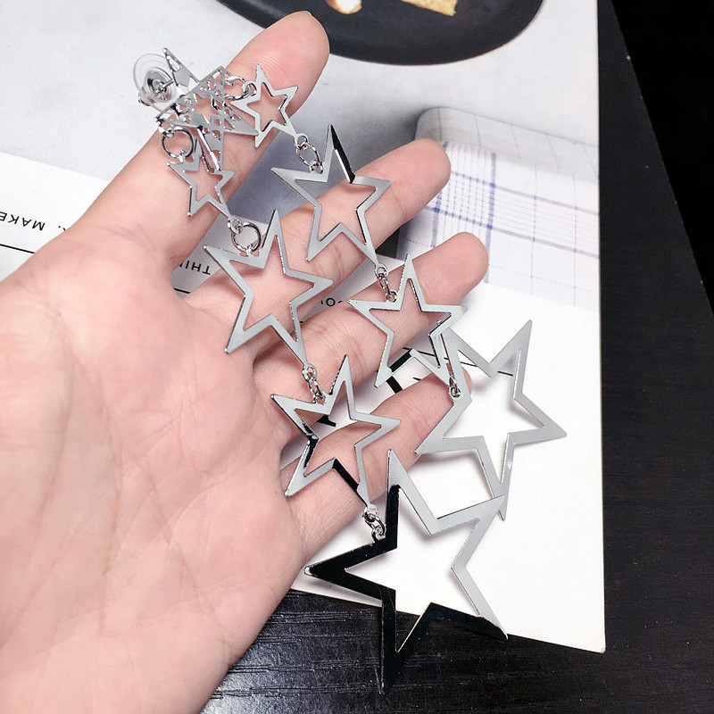 Fashion Metal Hollow Five-pointed Star Long Earrings display picture 5