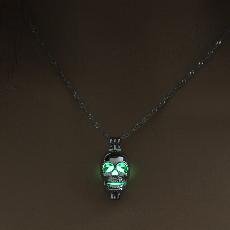 Fashion all-match hot sale luminous cage  hollow skull head pendant womenu0027s necklace