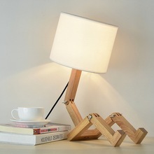 新款檯燈創意個性小機器人形燈具精美時尚家居卧室床頭木質台燈