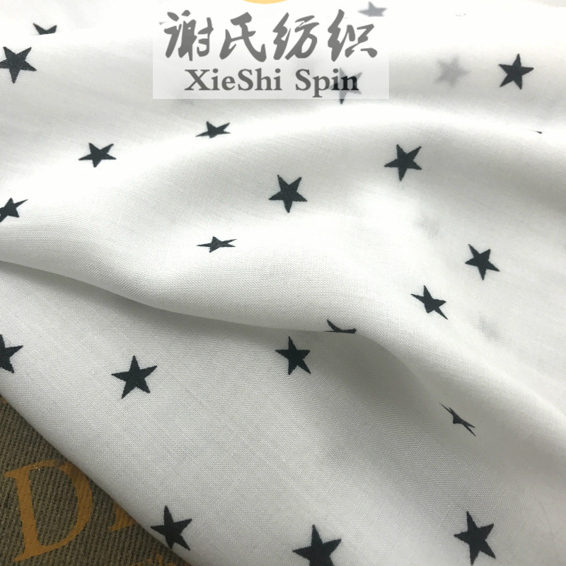 白色底星星印花人造棉水玉波点布料 五角星连衣裙子手工布艺面料
