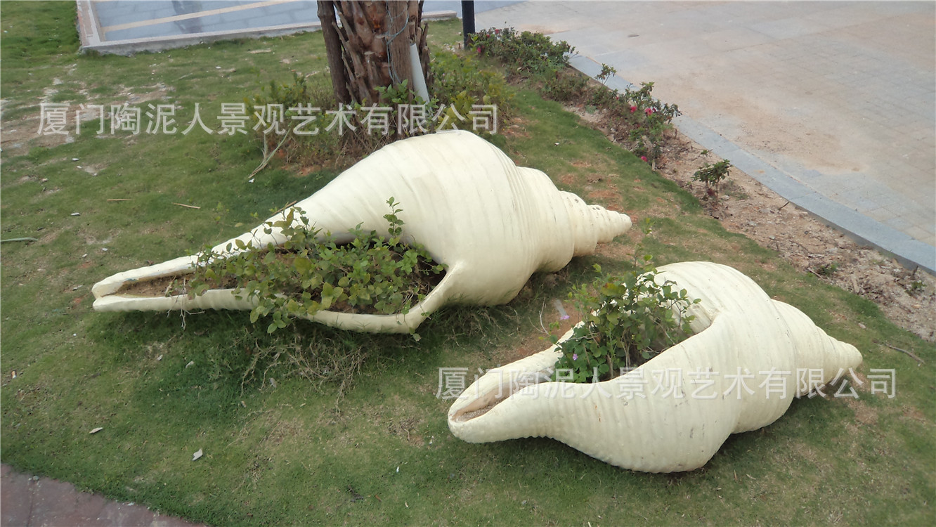 定制大型水泥海螺浮雕，打造城市广场园林景观雕塑