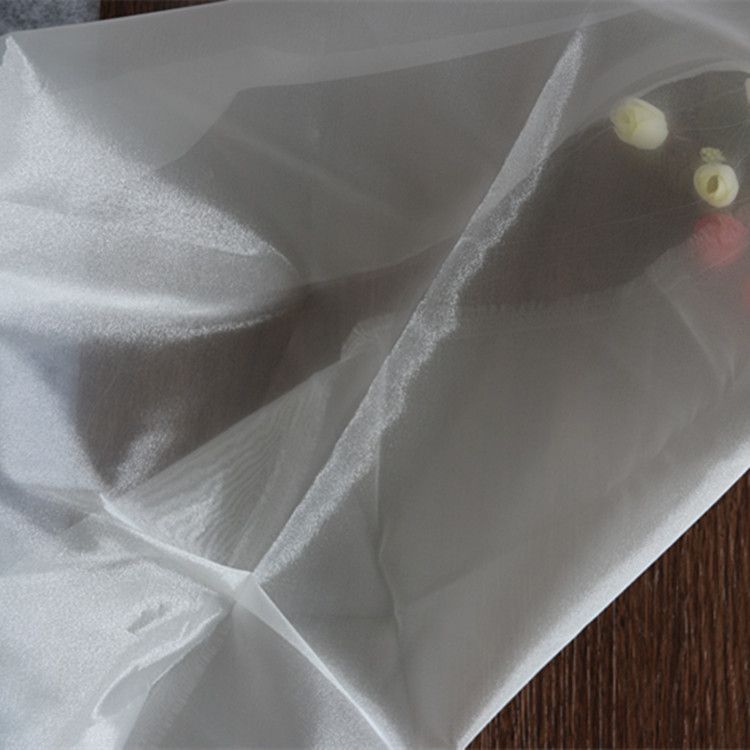 厂家批发三根三股欧根纱全涤锦涤家纺材质舞台服装布料裙摆抗皱