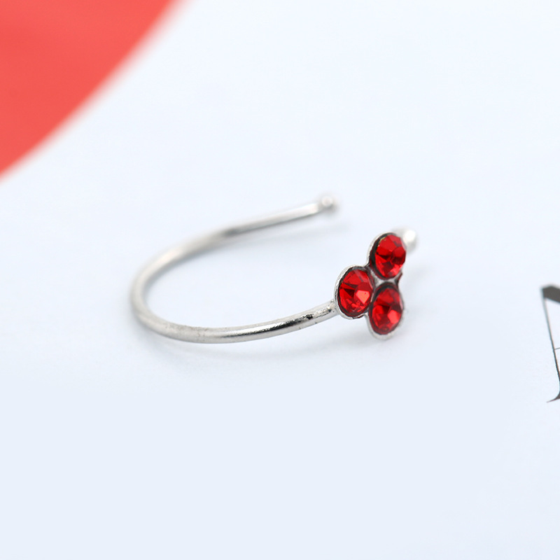 Silver pointed spike labret stud material detail