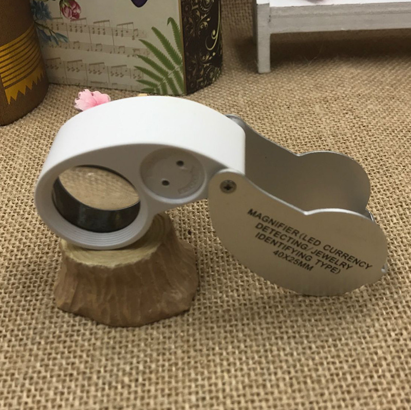 晶辉厂家直销 40x25MM高倍珠宝鉴定放大镜紫光白光21016