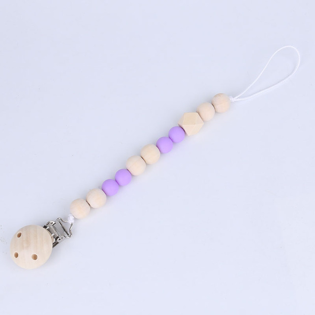 Venta directa de fábrica bebé calmante chupete de madera clip chupete cadena juguete anti-gota cadena mordedura música Comercio exterior Venta caliente