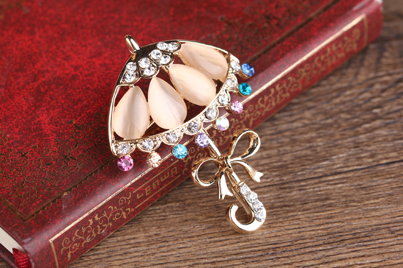 Korean fashion diamant katzenauge persönlichkeit kleine blume regenschirm corsage regenschirm pin kleine frische kleidung brosche_voghion.com