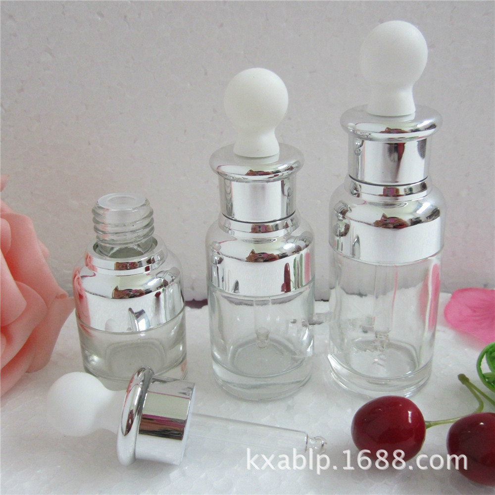 Venta al por mayor de fábrica 30ml 50ml botella de aceite esencial de vidrio transparente botella cuentagotas cosmética botella vacía botella