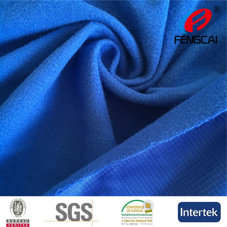 专业供应各种经编金光绒面料 经编全涤金光绒校服面料 规格齐全