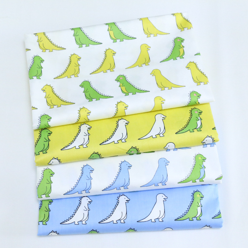 宝宝卡通小恐龙印花布全棉斜纹布 儿童四件套纯棉面料 厂家批发