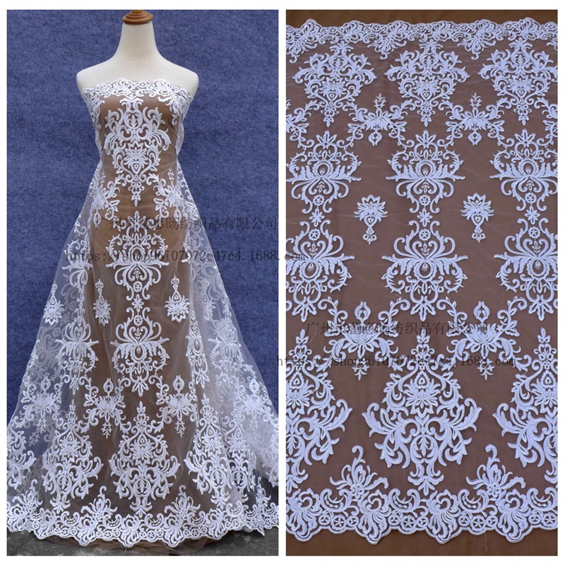 新款白色网布绣花面料 网布车骨刺绣婚纱礼服裙子服装布料批发