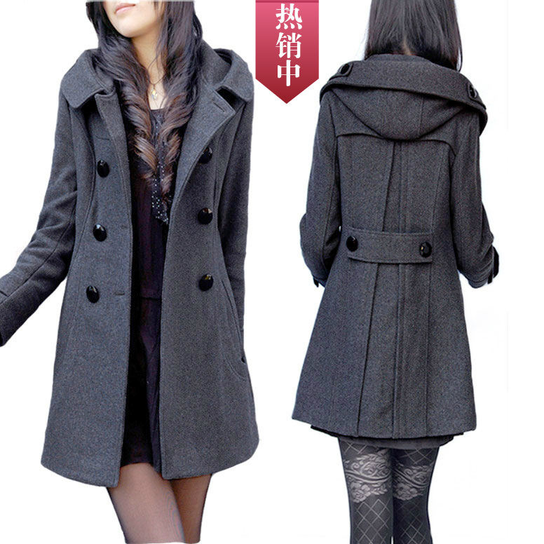 2017秋冬の新型の中の長いダブルボタンは帽子のコートと太って毛を厚くします。コートは太っています。