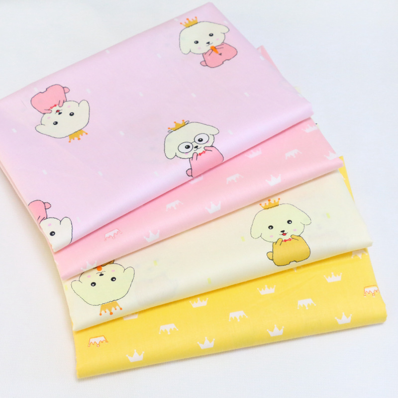 幼儿园宝宝布料 卡通小狗皇冠印花布 纯棉斜纹面料 环保印染布料