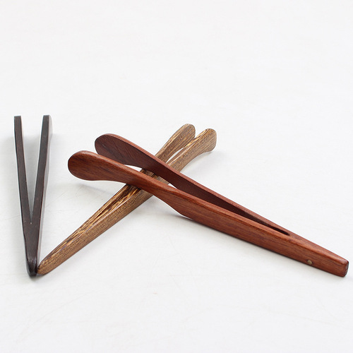 Manufacturer wholesale ebony solid wood tea clips chicken wing wood rosewood tea set accessories tea clips support design
