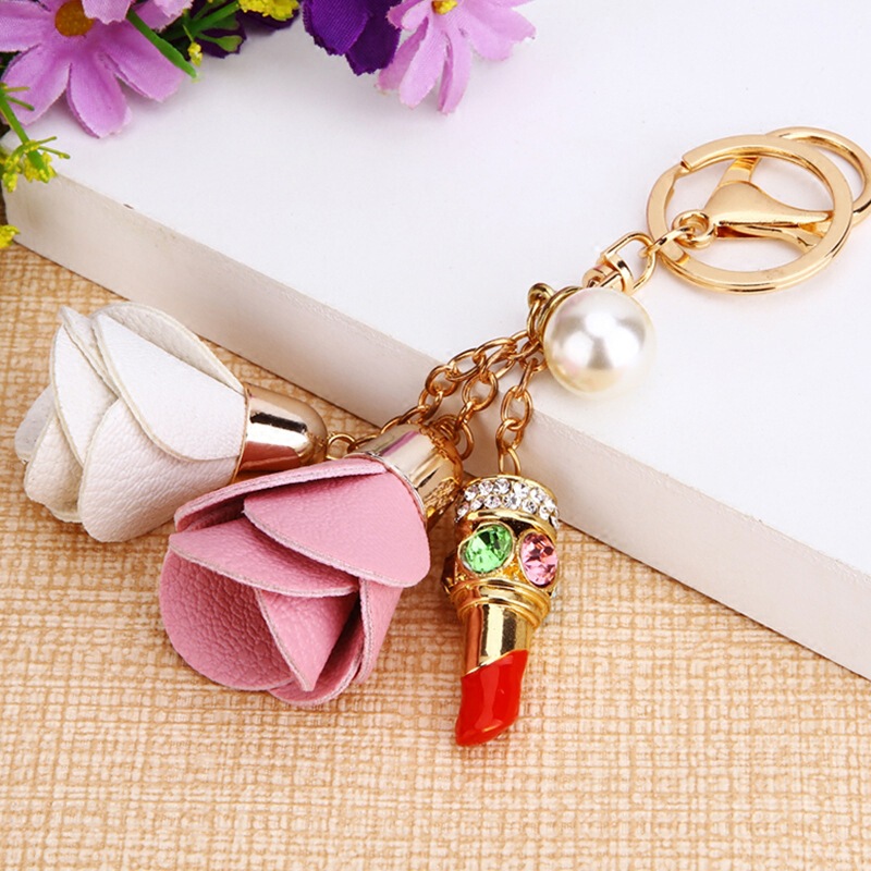 Leather flower rhinestone car key chain female Korean creative package pendant metal key chain small gift wholesale
