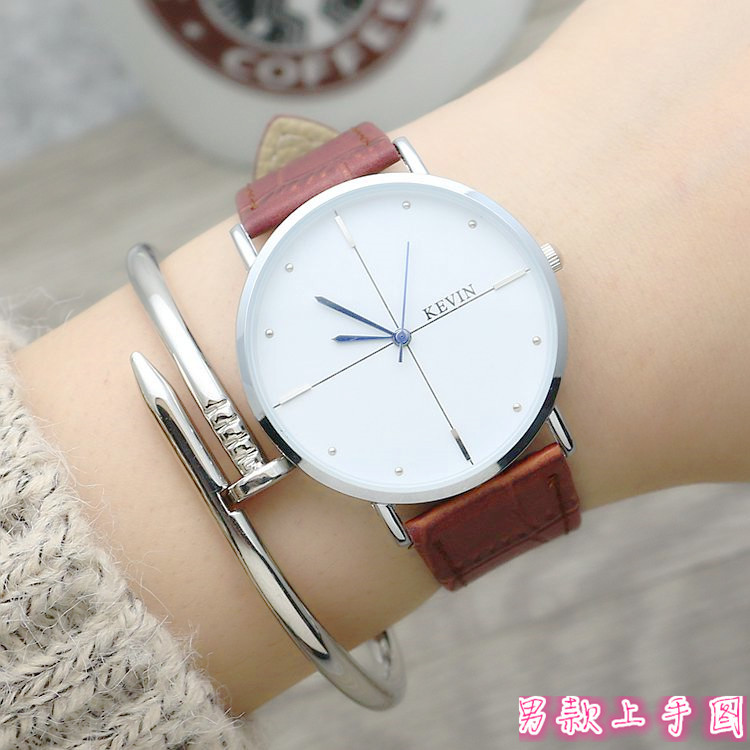 Factory direct silver shell simple thin couple watches men and girls belt watch retro quartz watch a generation of hair