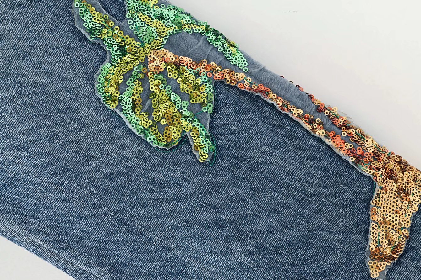 女式牛仔裤-2017春夏新款高腰宽松版亮片火鸟