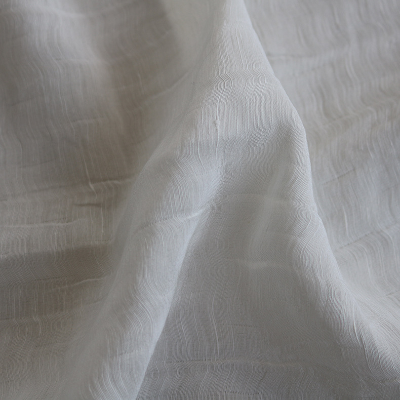 高端真丝提花服装面料 丝麻特泡绉提花新型花样服装布料厂家