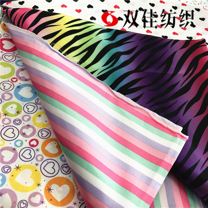 【厂家供应】印花七彩豹纹色丁绸缎布料 仿真丝面料 礼盒里布