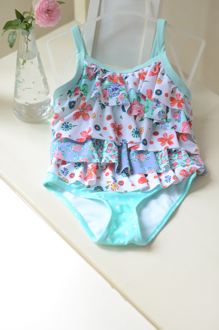 Blue and green dotted flower cake one piece