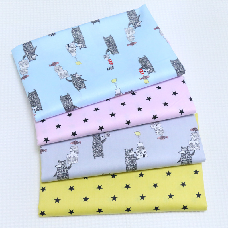 全棉布料批发 卡通小黑熊星星印花布 儿童床上用品纯棉斜纹布面料