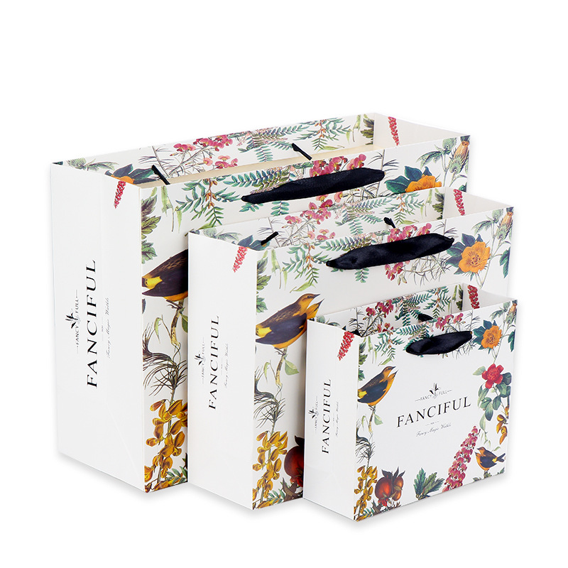 Ropa bolsa de regalo bolso bolsa de papel creativo retro exquisito bolso de compras impreso logo bolsa de regalo