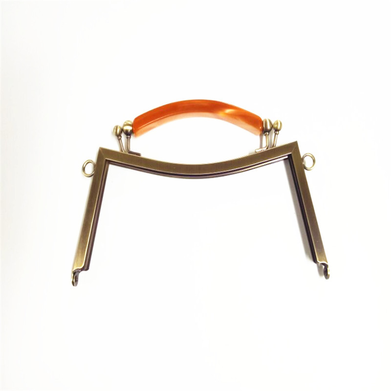 昕源五金厂供应手袋口夹包包五金铁铰包包口夹钱包口架订做