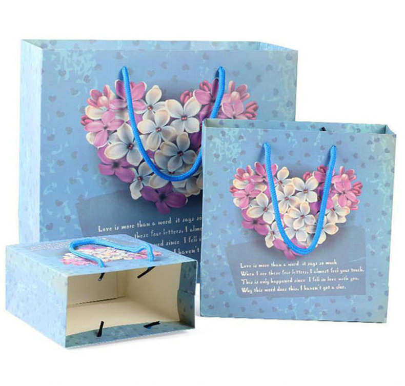 Bolsa de regalo floral bolsa de embalaje de ropa bolsa de papel de regalo de mano bolsa de regalo al por mayor bolso de regalo de ramo