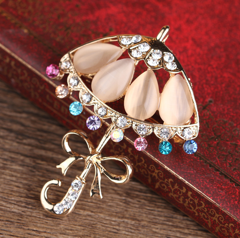 Korean fashion diamant katzenauge persönlichkeit kleine blume regenschirm corsage regenschirm pin kleine frische kleidung brosche_voghion.com