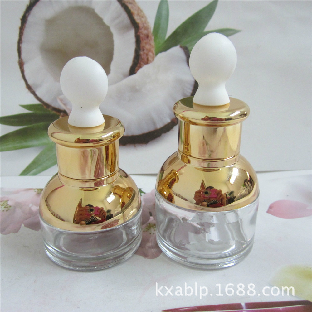 Venta al por mayor de fábrica 30ml 50ml botella de aceite esencial de vidrio transparente botella cuentagotas cosmética botella vacía botella