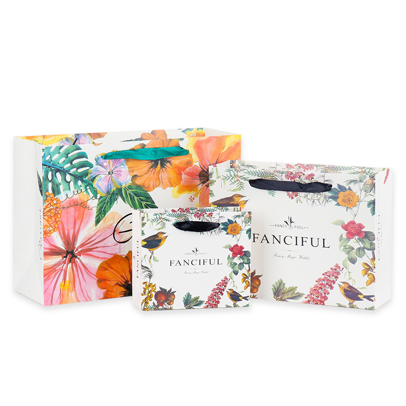 Ropa bolsa de regalo bolso bolsa de papel creativo retro exquisito bolso de compras impreso logo bolsa de regalo