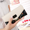 2023 new Korean version of the pastoral floral floral diamond contrasting color envelope with three folding folding folded cockle long ladies wallet