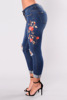 fashion holes embroidered high waist elastic jeans Occident