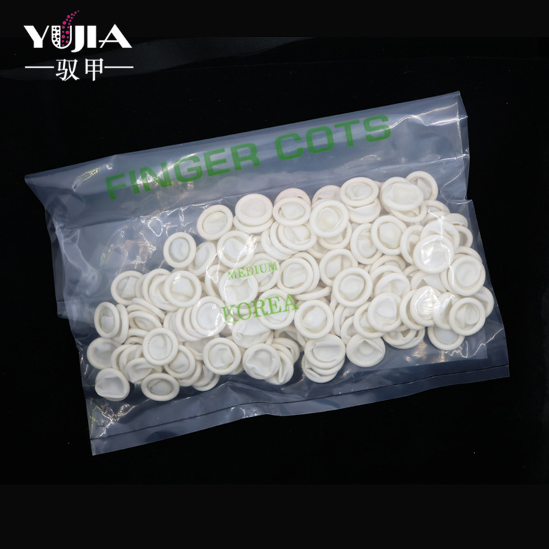 Suministros de uñas al por mayor guantes de dedo guantes de látex desechables guantes de goma de uñas blancas sobre 800 unids/bolsa