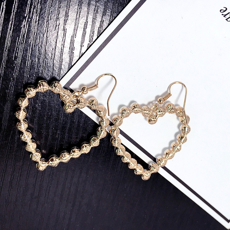 Retro Simple Pearl Heart Earrings display picture 3