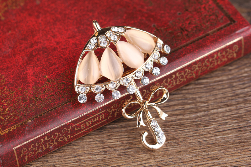 Korean fashion diamant katzenauge persönlichkeit kleine blume regenschirm corsage regenschirm pin kleine frische kleidung brosche_voghion.com